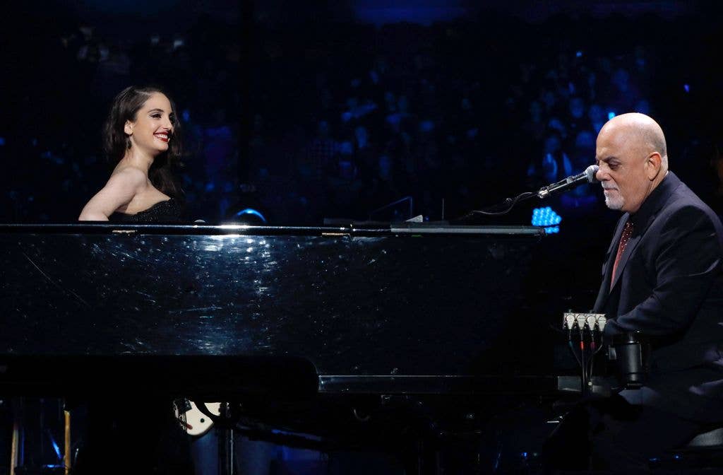Alexa Ray Joel joins her father Billy Joel onstage for a duet of the holiday classic "Merry Little Christmas" during Billy Joel's sold out show at Madison Square Garden on December 19, 2018 in New York City.