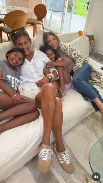 The family was all smiles on Hoda's special day