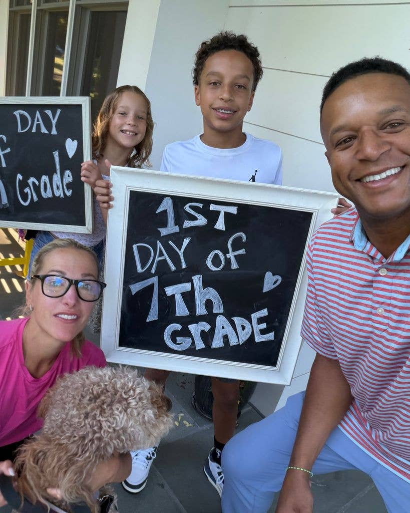 Craig posing with wife and two kids for selfie