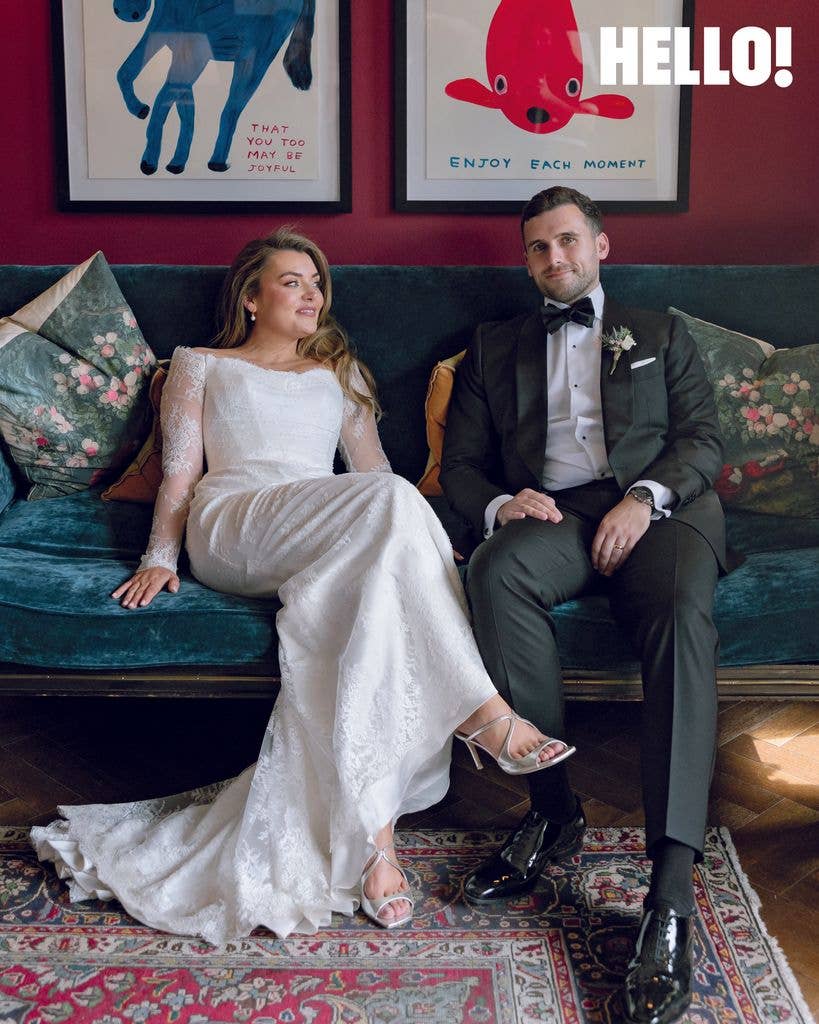 Newlyweds Rosie Kelly and Steve White pose after their ceremony