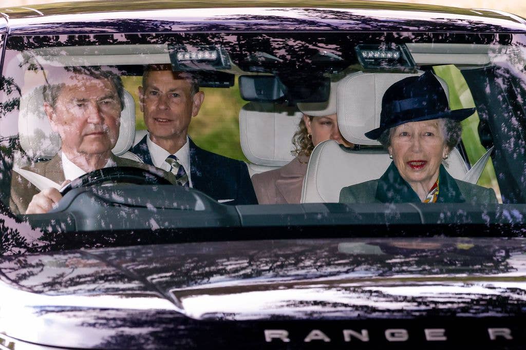Timothy Laurence, Princess Anne and Prince Edward, Duke of Edinburgh arrive for a service at Crathie Kirk Church