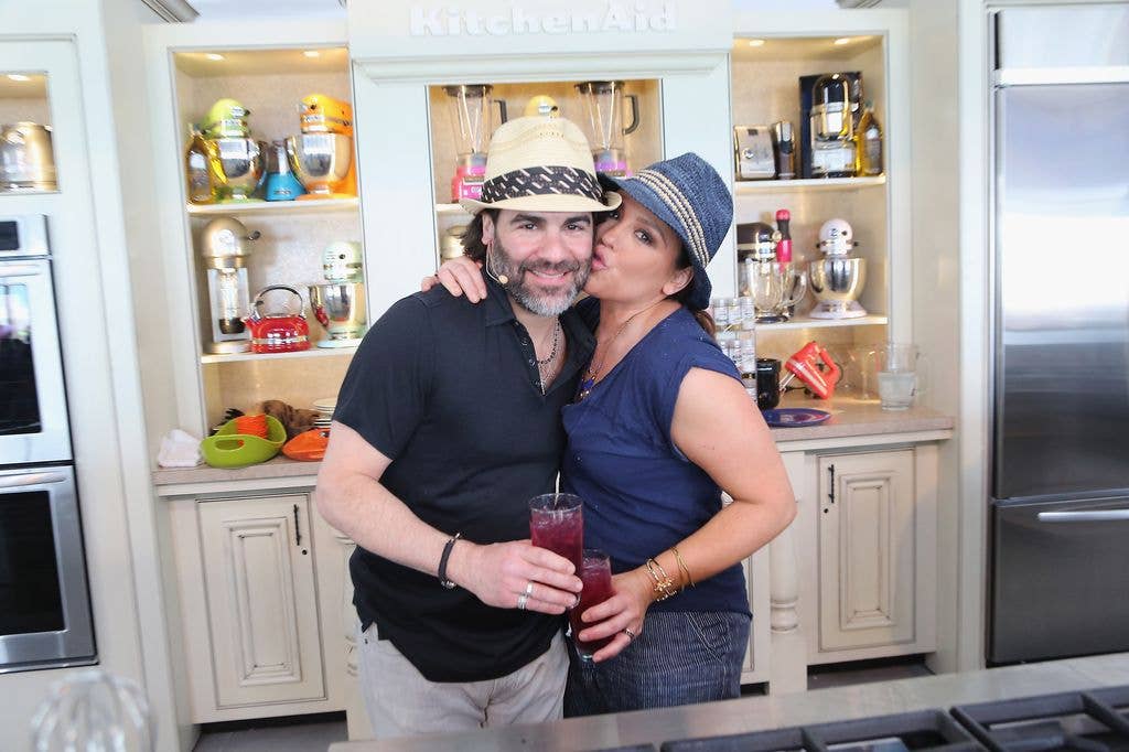 Rachael Ray kissing John Cusimano on the cheek