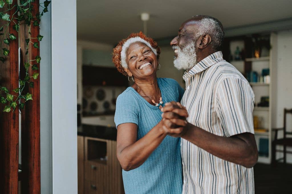senior couple dancing together