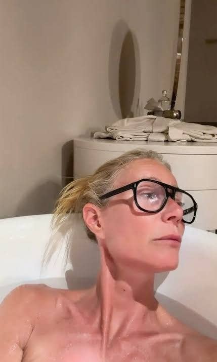 Screengrab of Gwyneth Paltrow's first TikTok; she is lying in the bathtub naked