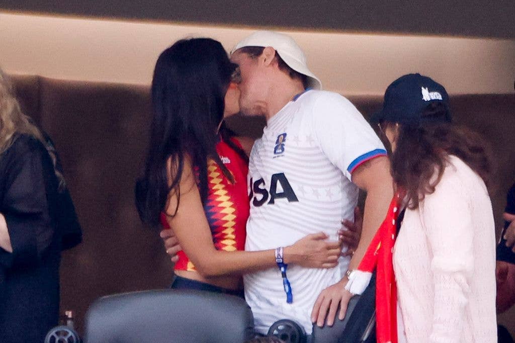 Ines de Ramon and Brad Pitt kissing during the FIFA World Cup 2026 Quarter Final football match between Spain and Belgium at Los Angeles Stadium on July 10, 2026 in Inglewood near Los Angeles, California. (Photo by Jean Catuffe/Getty Images)