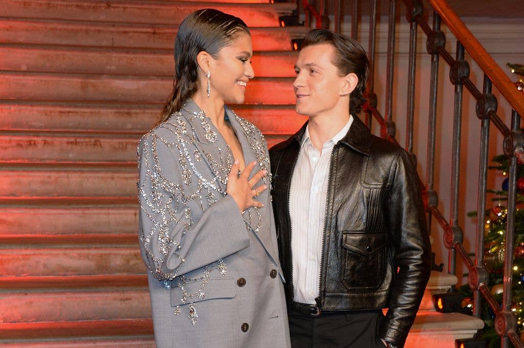 Zendaya and Tom Holland pose at a photocall for "Spider-Man: No Way Home" at The Old Sessions House on December 5, 2021 in London, England. (Photo by David M. Benett/Dave Benett/WireImage)