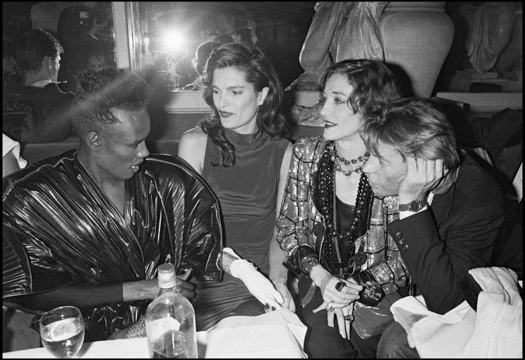 Grace Jones, Helmut Berger and his girlfriend at the party for the "Palace" fifth anniversary.