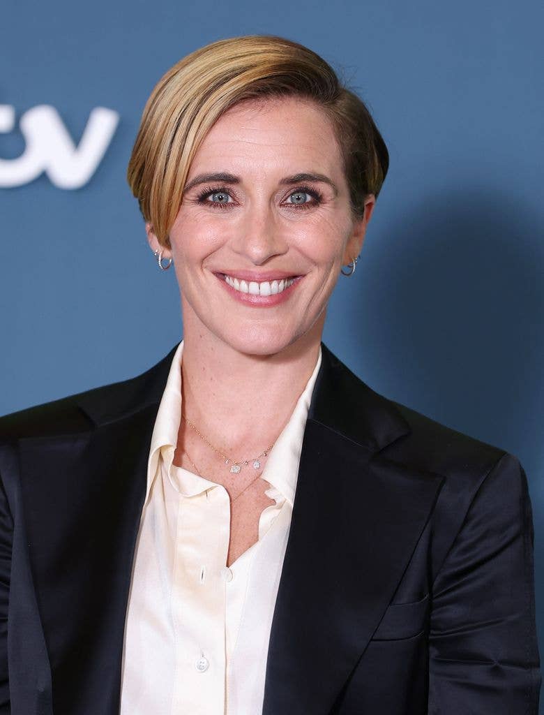 Vicky McClure smiling in white shirt and black blazer