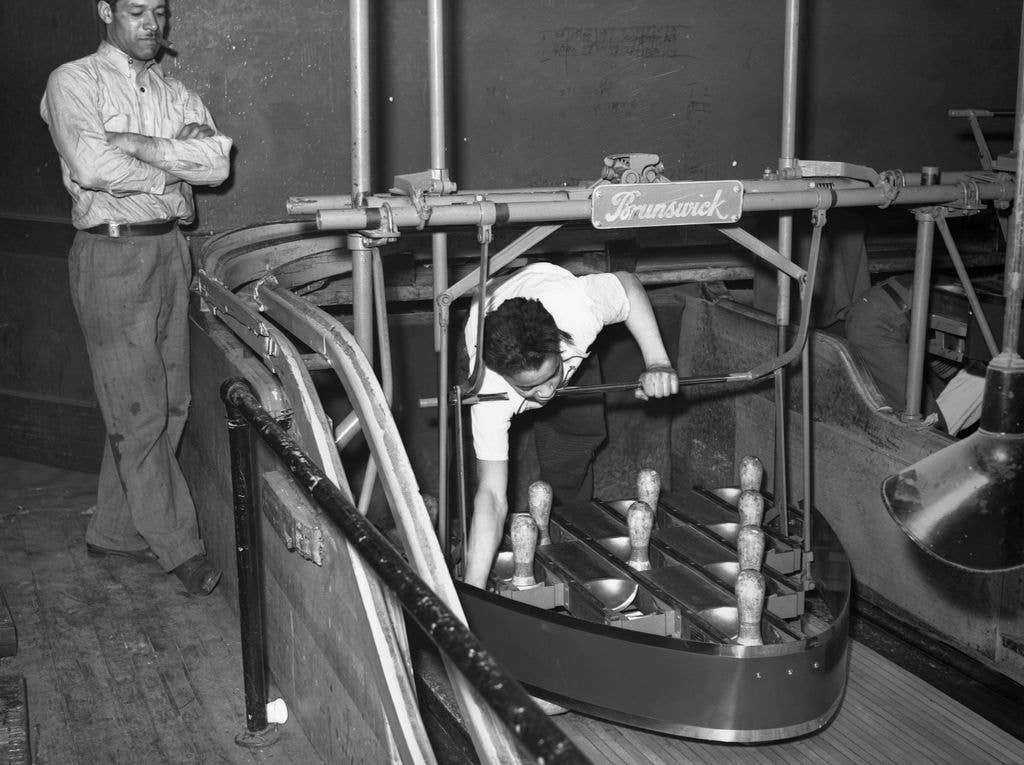 Setting up the pins in a Chicago, Illinois, bowling alley in April 1941. 