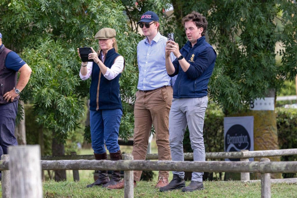Felix, wearing a Royal Windsor Horse Show cap, cheered on Louise from the sidelines
