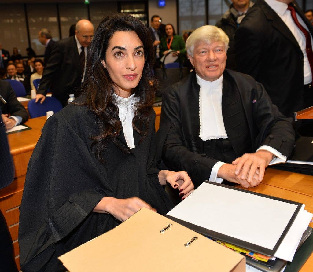 Amal Clooney (L), representing Armenia, is seen on January 28, 2015 before the start of the appeal hearing at the European Court of Human Rights.