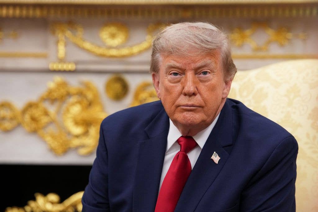 Donald Trump looks on during a bilateral meeting with the Prime Minister of Iraq Ali al-Zaidi, in the Oval Office of the White House on July 14, 2026 in Washington, DC.  In his first foreign trip since taking office, Zaidi is visiting the White House to hold talks on U.S. investment into the Iraqi economy amid instability in the region.  (Photo by Andrew Harnik/Getty Images)