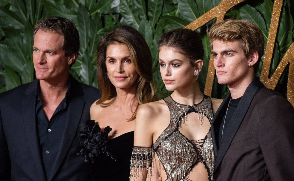 Presley with his sister Kaia, mom Cindy and dad, Rande at an event