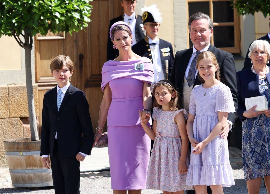 Prince Nicolas of Sweden, Princess Madeleine of Sweden, Princess Adrienne of Sweden, Christopher OâNeill and Princess Leonore of Sweden leave after the christening of Princess Ines of Sweden at the Drottningholm Palace Chapel 