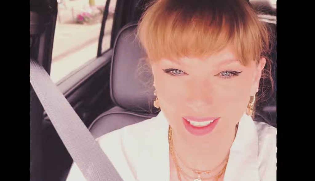 Screenshot of Taylor Swift sitting in car seat in "Cleveland!!!" music video