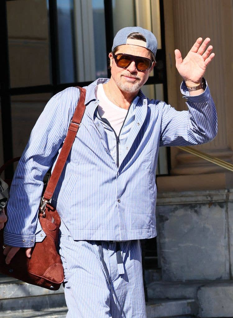 brad pitt waving blue outfit