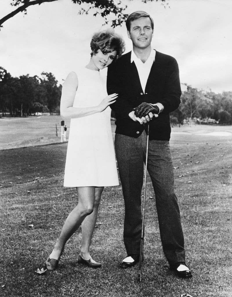Jill St John and Robert Wagner during a round of golf, to promote their movie Banning in 1967
