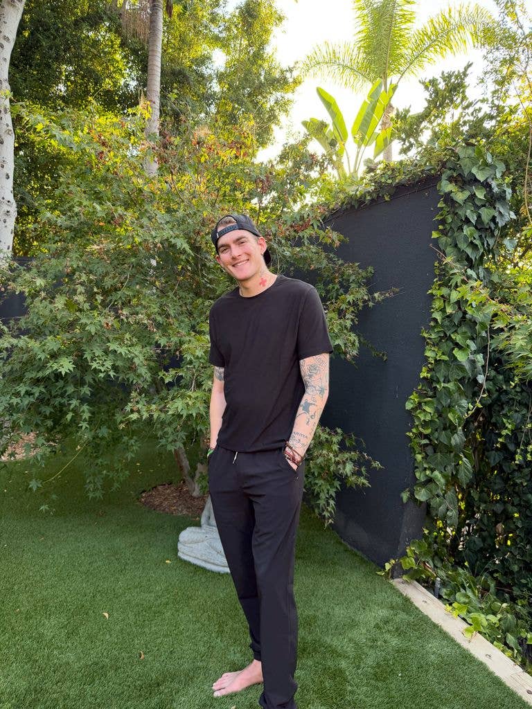 Presley Gerber looking happy and healthy standing in a garden smiling 