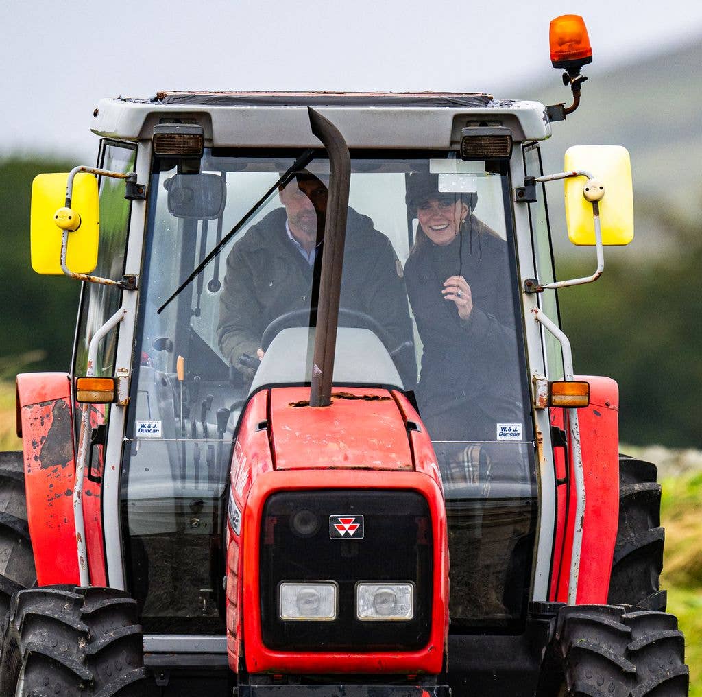 Catherine laughed as her husband William attempted to drive a tractor onto a beach on the Isle of Bute