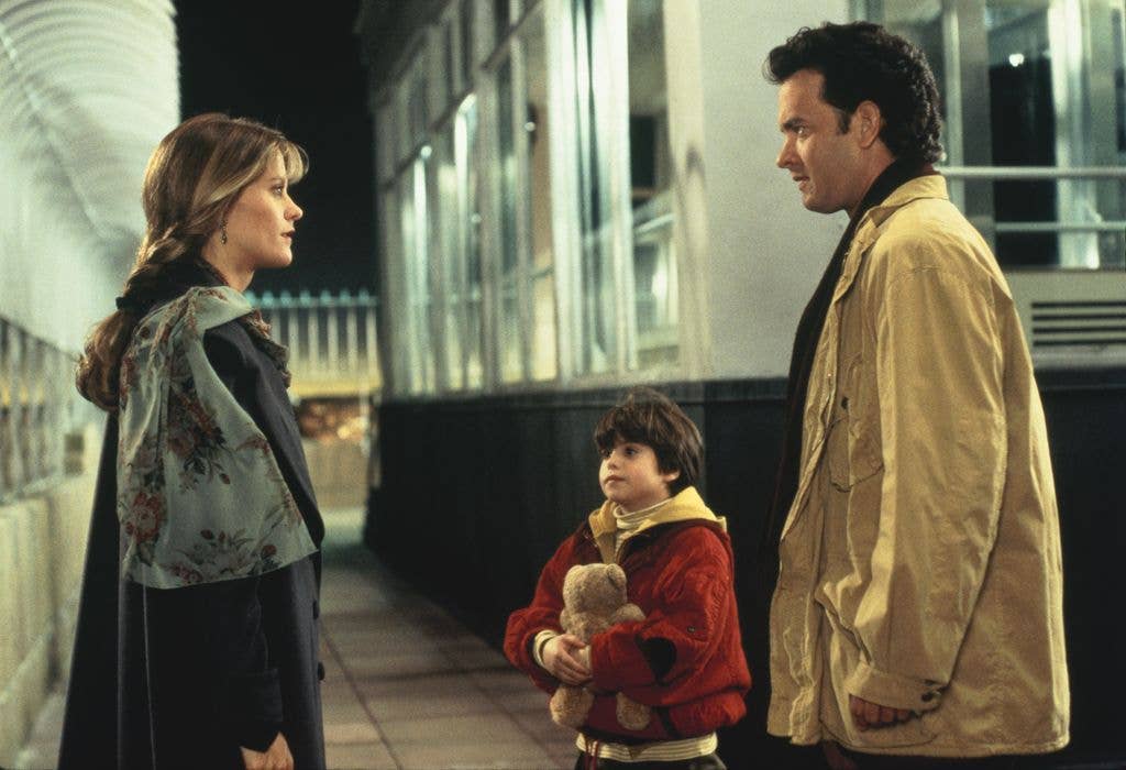 Meg as Annie alongside Ross Malinger as Jonah Baldwin and Tom Hanks as Sam Baldwin in Sleepless in Seattle