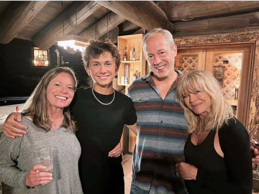 Goldie Hawn poses with her daughter-in-law Erinn Hudson's family plus her grandson Bodhi for a photo inside her home in Colorado, shared on Instagram