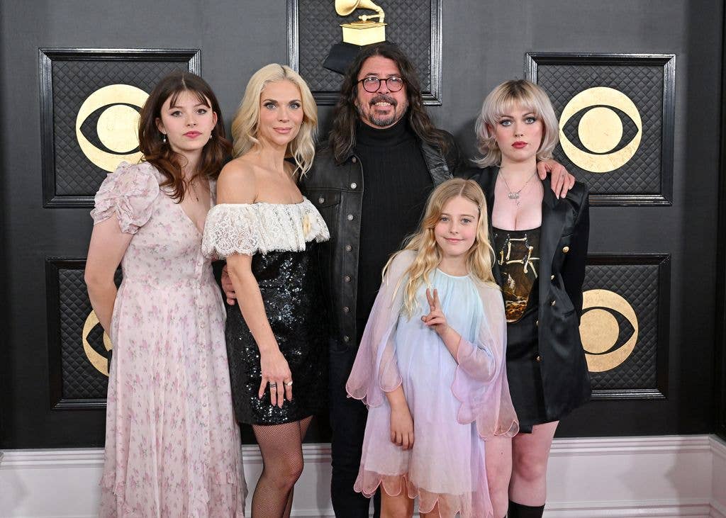 ) (L-R) Harper Grohl, Jordyn Blum, Dave Grohl, Ophelia Grohl, and Violet Grohl attend the 65th GRAMMY Awards