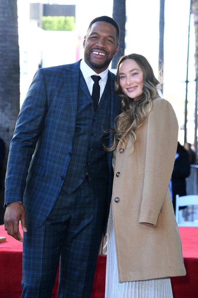 Michael Strahan and Kayla Quick attend The Hollywood Walk of Fame star ceremony honoring Michael Strahan on January 23, 2023 in Los Angeles, California. (Photo by JC Olivera/Getty Images)