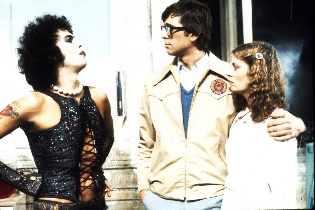 Actors Tim Curry, Barry Bostwick and Susan Sarandon in scene from movie "The Rocky Horror Picture Show"