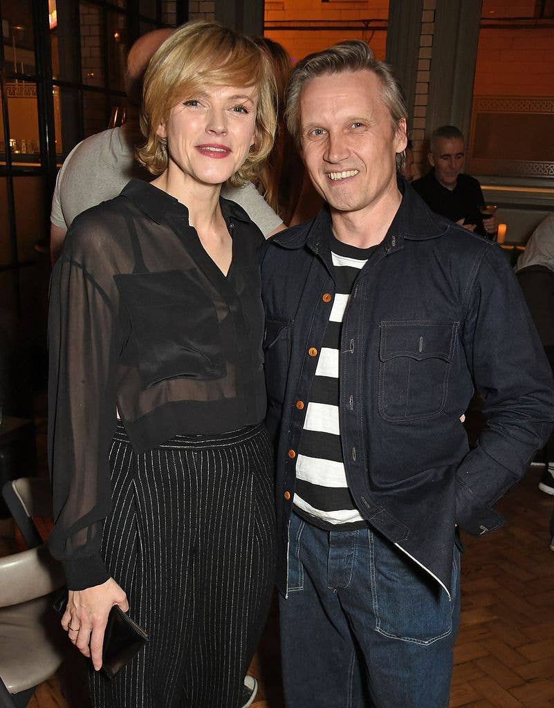 Maxine Peake and a man in a striped shirt and navy jacket at an event.