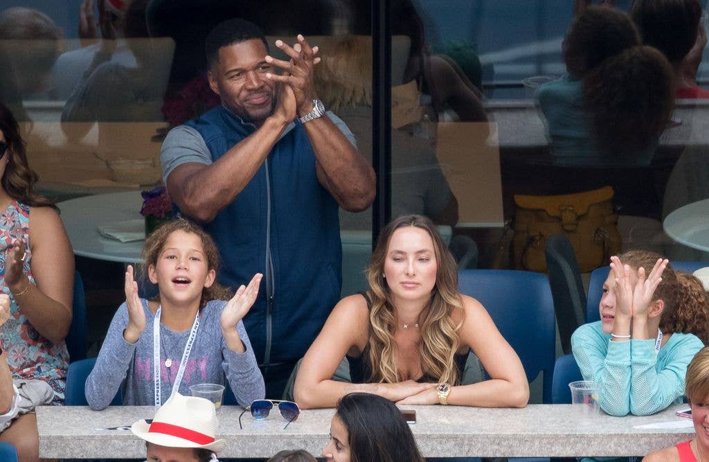 Michael Strahan with 2 daughters and girlfriend Kayla Quick at USTA Billie Jean King National Tennis Center on September 5, 2016 in the Queens borough of New York City.  (Photo by BBD/GC Images)