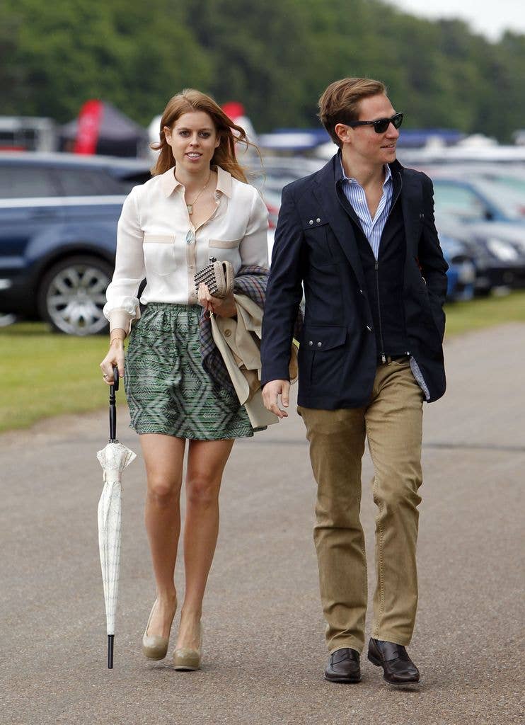 Beatrice was equipped with an umbrella in hand