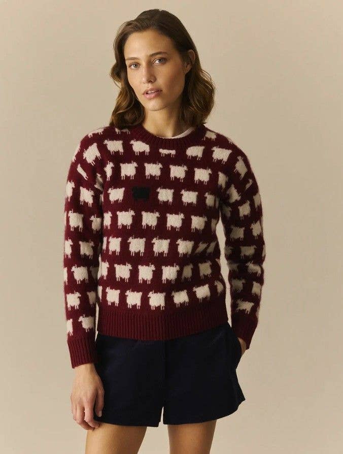 The sweater has been designed in burgundy for 2026