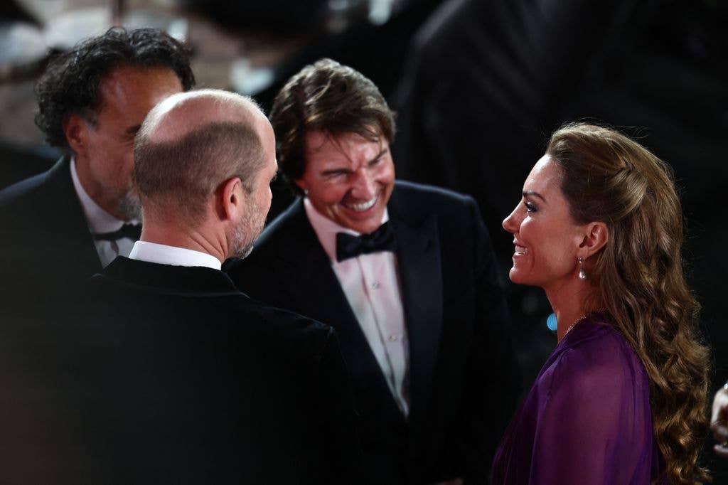 Mexican filmmaker Alejandro Gonzalez Inarritu (L) and US actor Tom Cruise (2R) speak with Britain's Prince William, Prince of Wales and Britain's Catherine, Princess of Wales as they arrive for the global premiere of the film 'Digger' in Leicester Square in central London