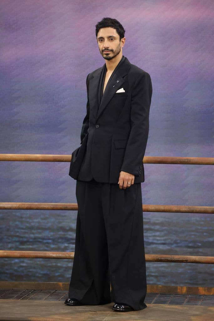 Riz Ahmed in suit with wide leg trousers