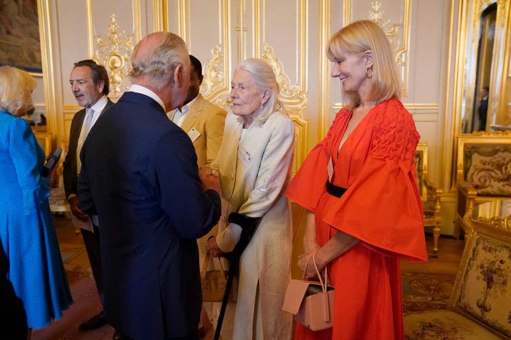 King Charles III speaks to Vanessa Redgrave (2nd R) during a reception at Windsor Castle in Berkshire, to celebrate the work of William Shakespeare on the 400th anniversary of the publication