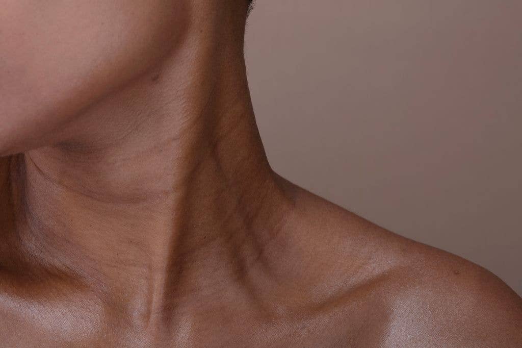 Close-up of woman's neck