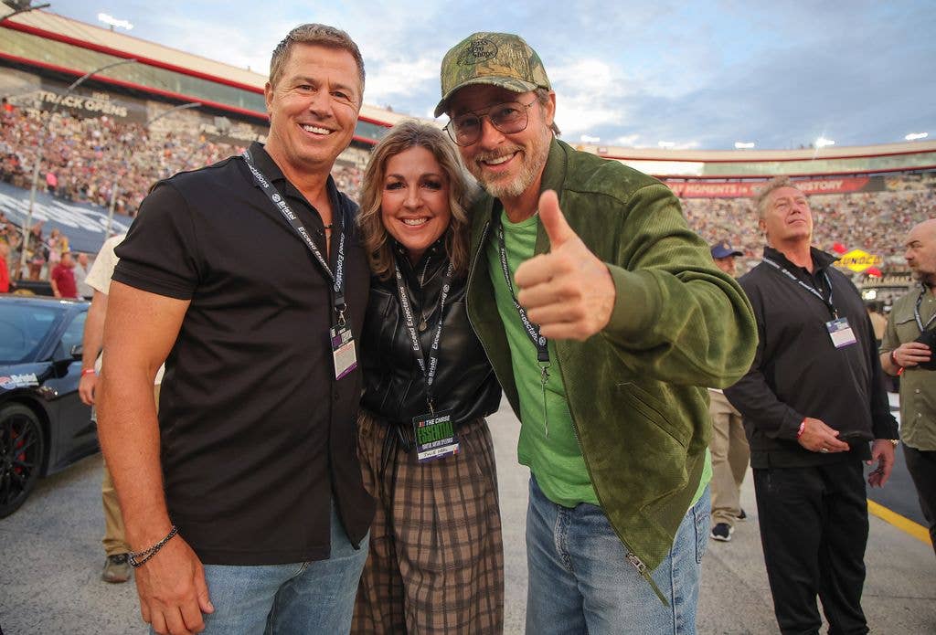Grand Marshals Brad Pitt (R) poses with siblings Julie Neal and Doug Pitt on the grid prior to the NASCAR Cup Series Bass Pro Shops Night Race at Bristol Motor Speedway on September 19, 2026 in Bristol, Tennessee.