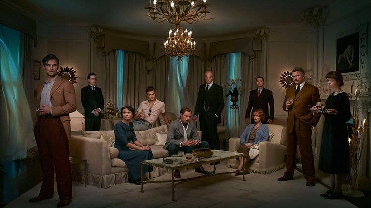 A group of people standing in living room 