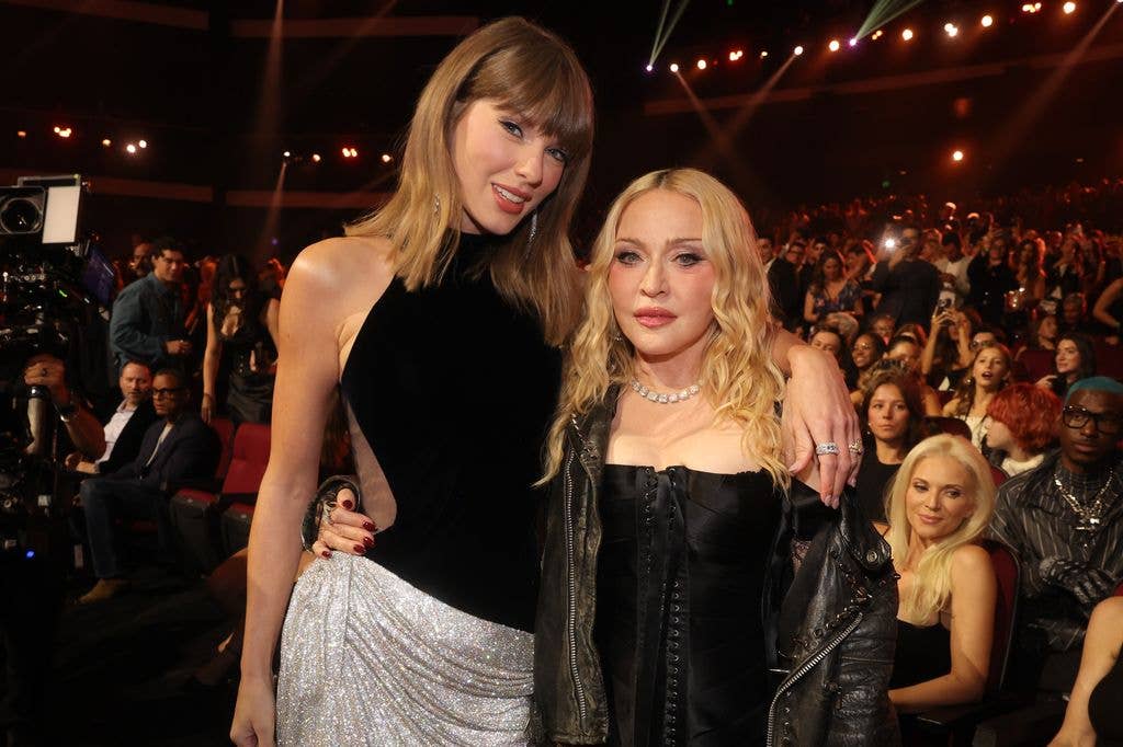 Madonna caught up with many familiar faces at the VMA's including Taylor Swift