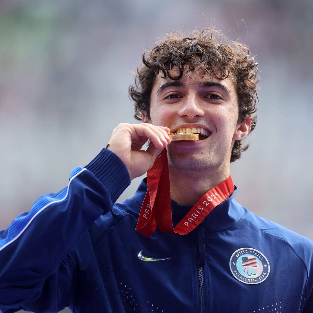 Gold medalist Ezra Frech of Team United States celebrates during the Men's High Jump T63 Medal Ceremony on day seven of the Paris 2024 Summer Paralympic Games at Stade de France on September 04, 2024 in Paris, France.