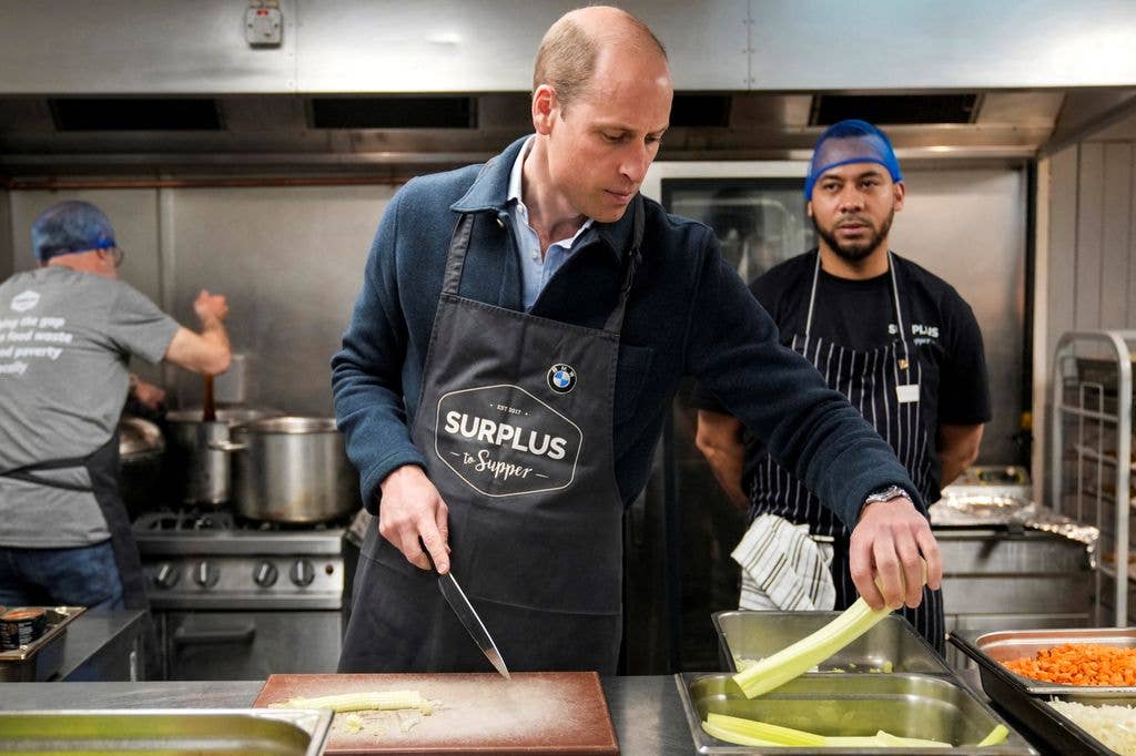 The Prince of Wales cuts celery 