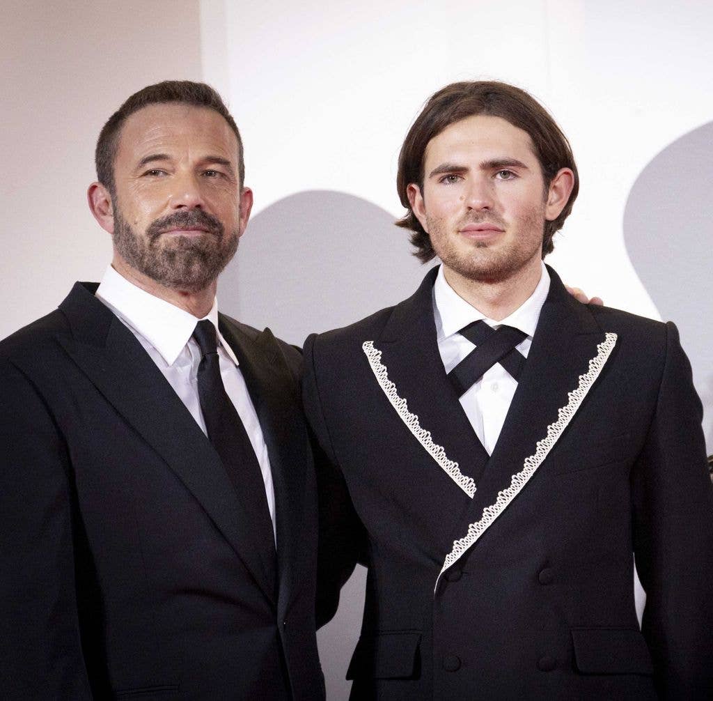 Ben Affleck and Indiana Affleck in suits on red carpet