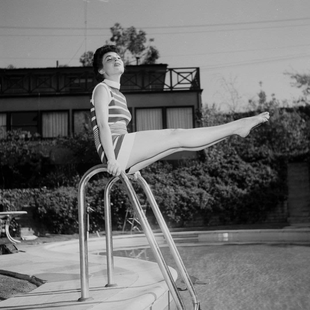 Actress Anne Bancroft poses at her home in Los Angeles, California