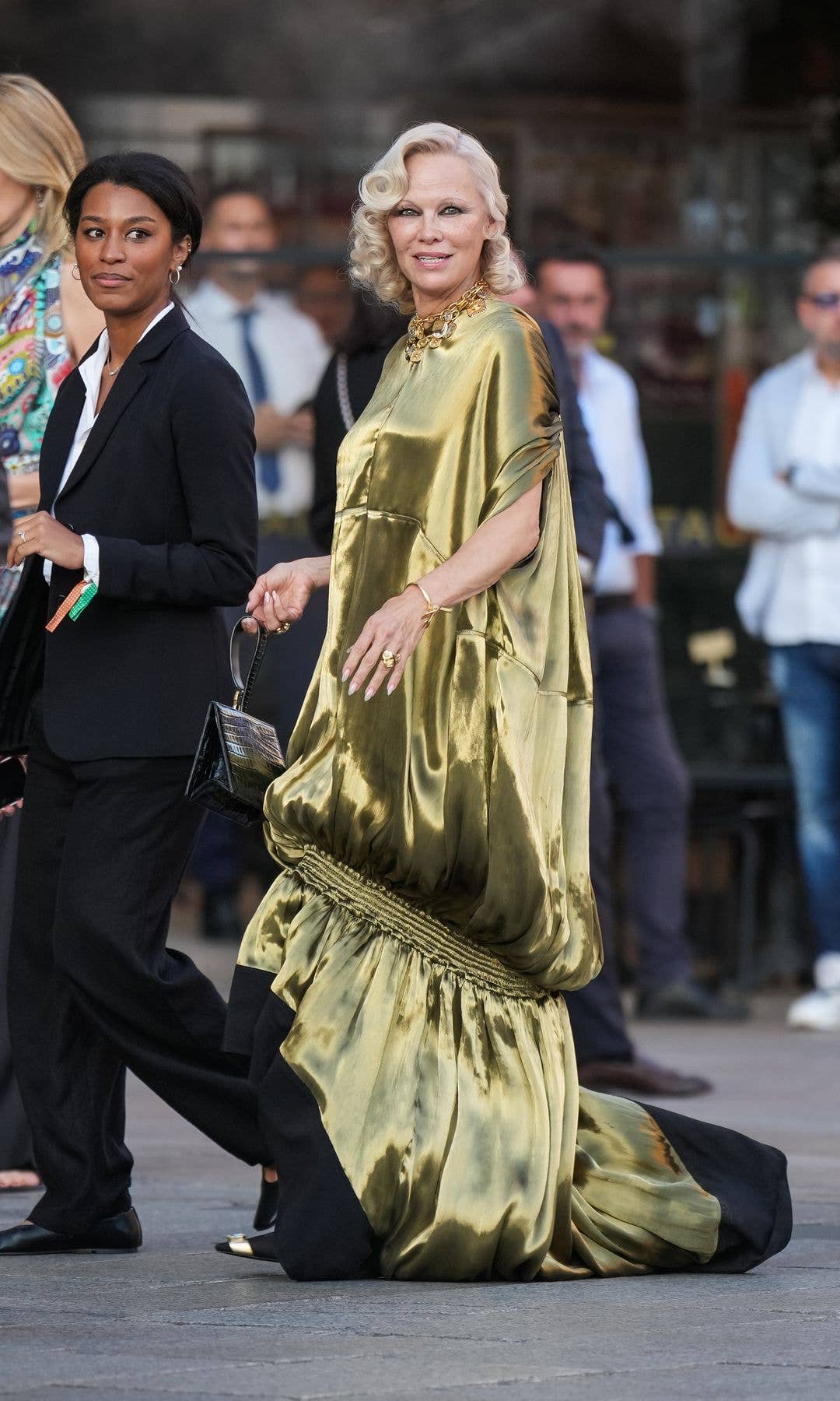 Pamela Anderson arrives at the Vogue World show during the Milan Fashion Week - Womenswear Spring/Summer 2027 on September 22, 2026 in Milan, Italy.