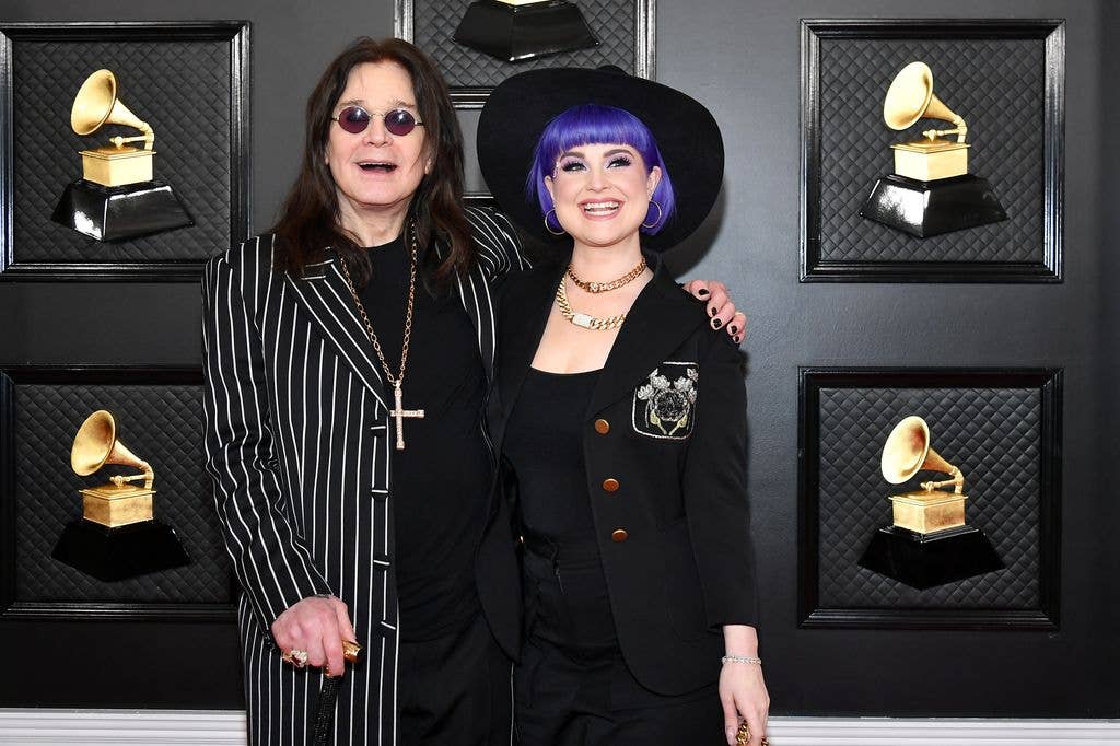 Kelly Osbourne looking happy with her father Ozzy in 2020