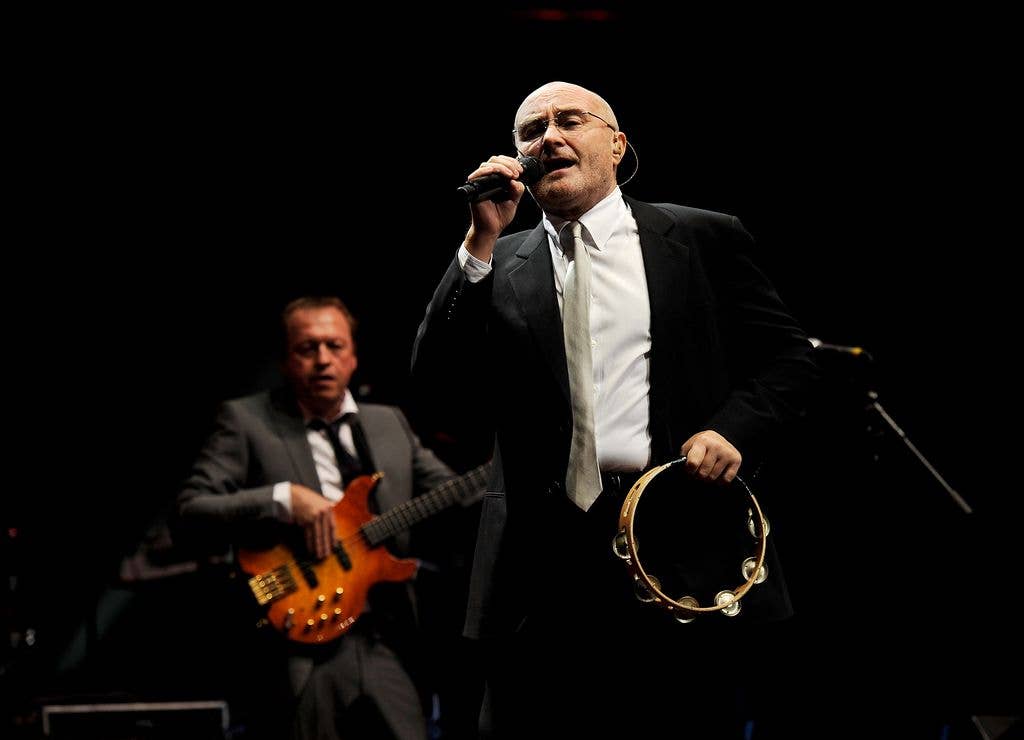 Musicians Mark King (L) and Phil Collins perform at The Prince's Trust Rock Gala 2010 supported by Novae at the Royal Albert Hall on November 17, 2010 in London, England. (Photo by Ian Gavan/Getty Images)