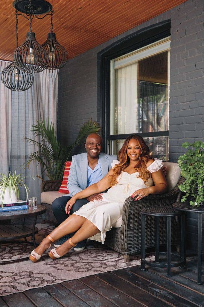 Tracy and Lio relaxing on their front porch