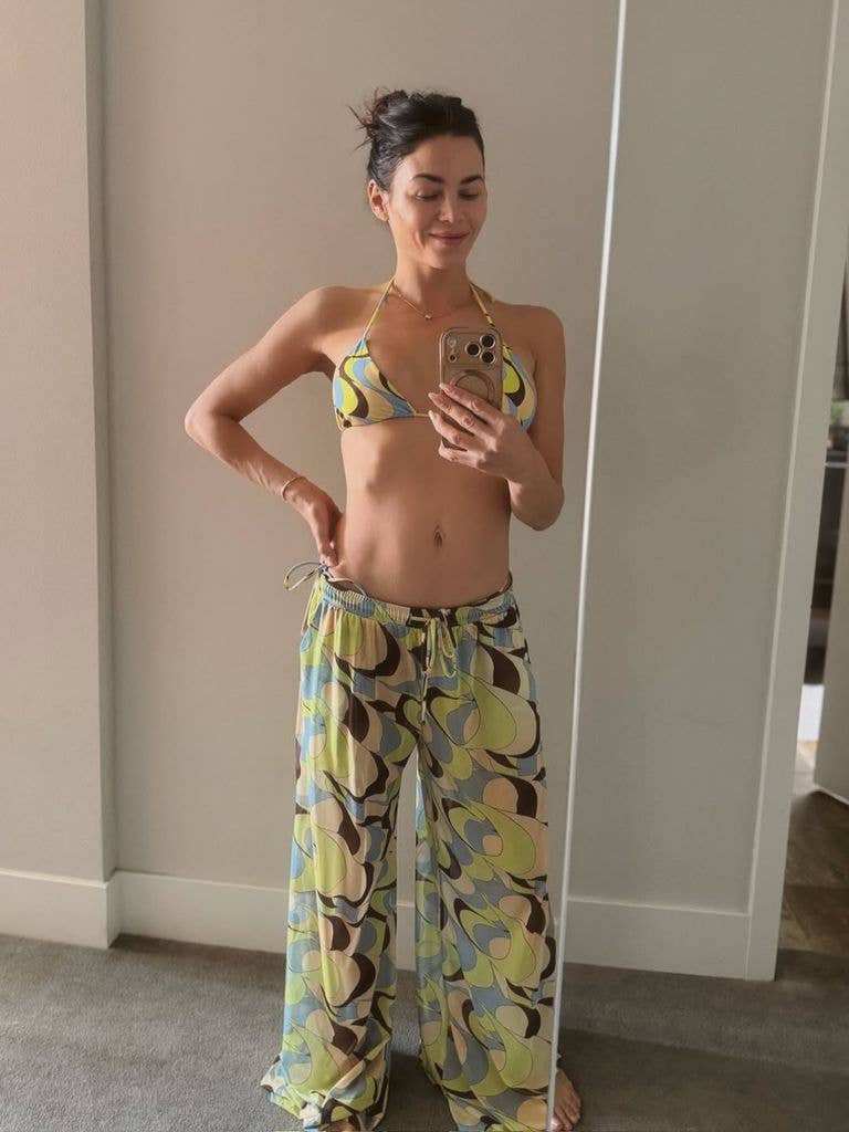 Jenna also rocked a colorful print bikini top and matching flowing pants